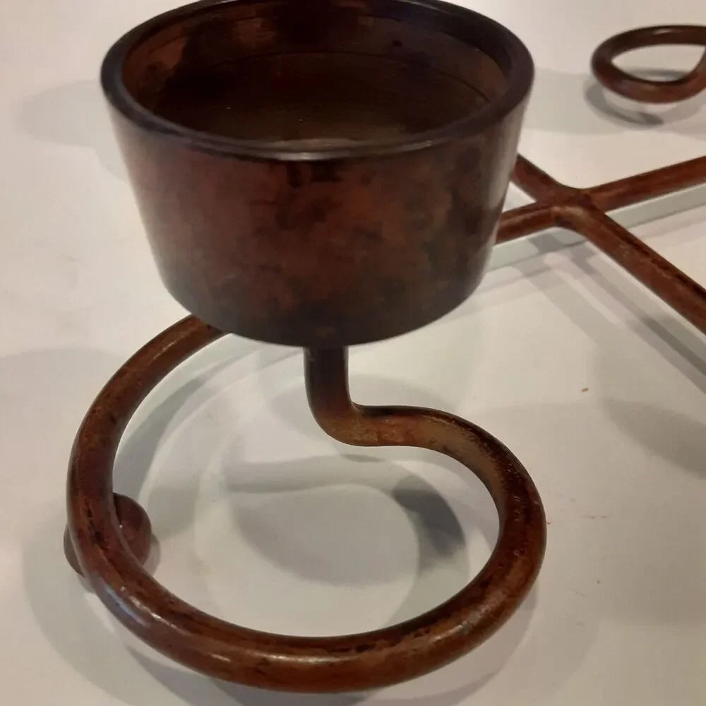 Scrolled Metal 4 prong Candle Holder Distressed Bronzed Finish